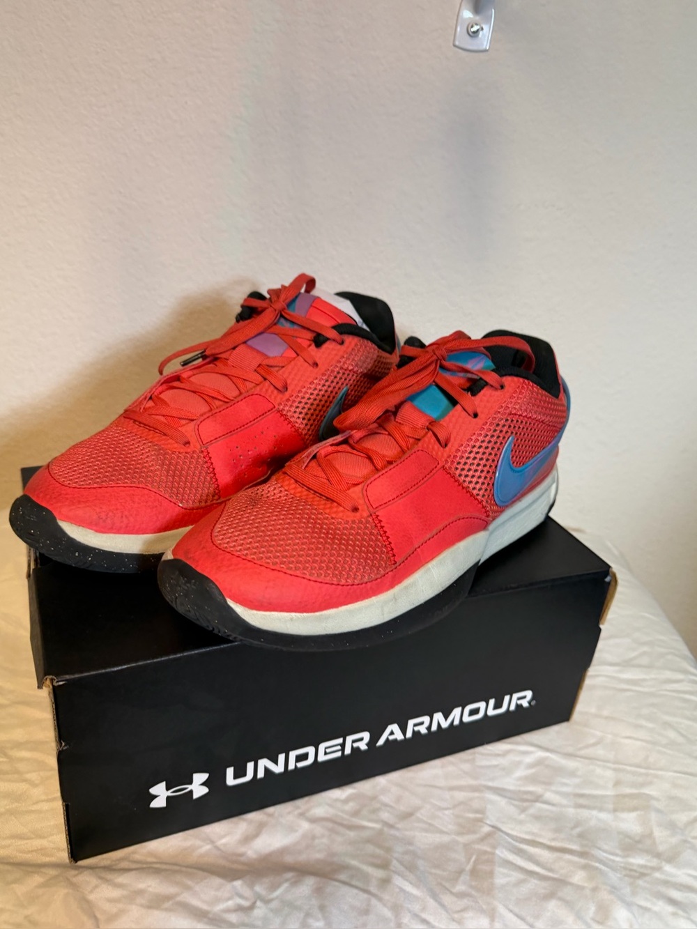 Men’s 10.5 Red Athletic Sneakers with Blue Swoosh Accent